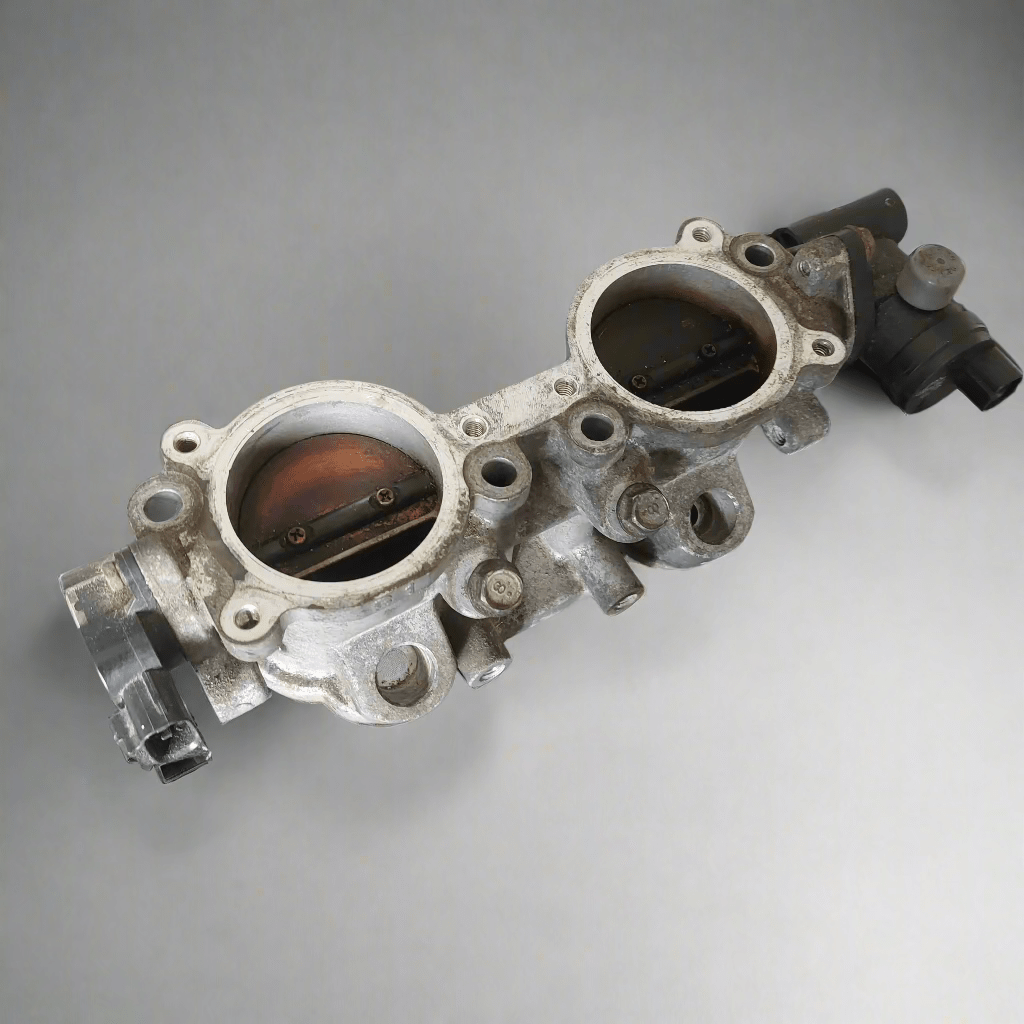 OEM 2004-2007 Subaru Impreza WRX LH Drivers Side TGV Top Feed 14011AB371