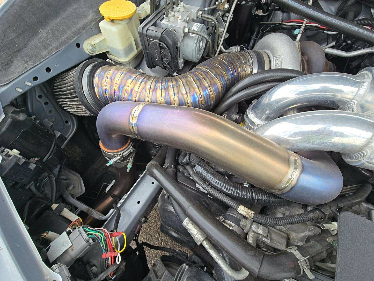 CUSTOM rotated turbo kit ( like ETS ) 08-21 STi 08-14 WRX w: PTE 6466 gen 900 HP & custom pie cut TITANIUM intake SUBARU