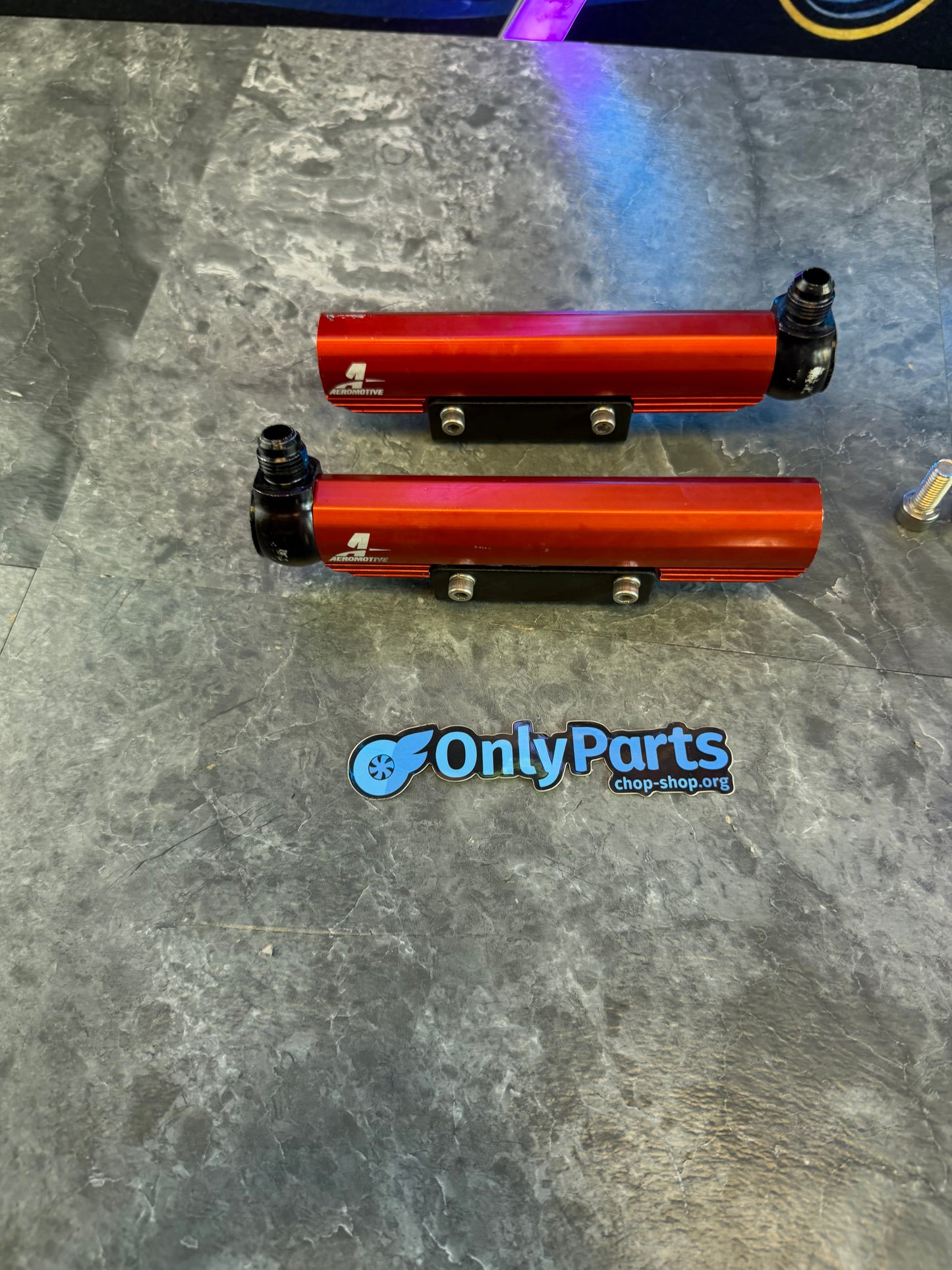 Areomotive fuel rails Subaru STi and wrx top feed billet red