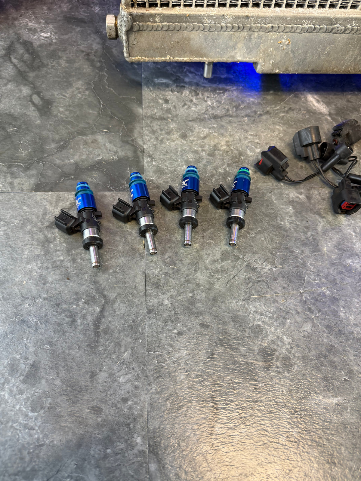 FIC 1440 CC top feed fuel injectors Subaru wrx and STi E85 flex fuel w/ plug & play adapters
