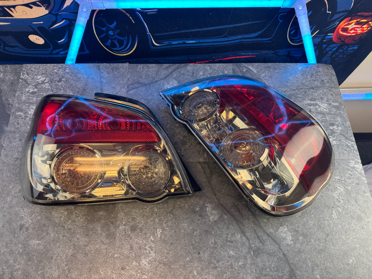 2006-2007 Subaru WRX STi Sedan OEM Rear Tail Lights Tinted Pair Set Chrome
