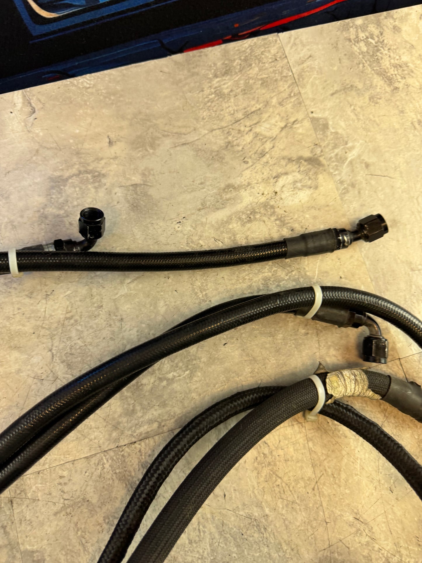 2008-2021 Subaru WRX STi Cobb Tuning PTFE Braided Fuel Lines Kit N1