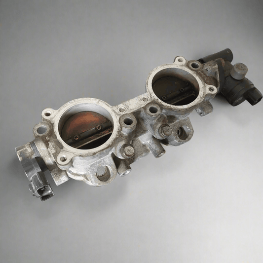 OEM 2004-2007 Subaru Impreza WRX LH Drivers Side TGV Top Feed 14011AB371