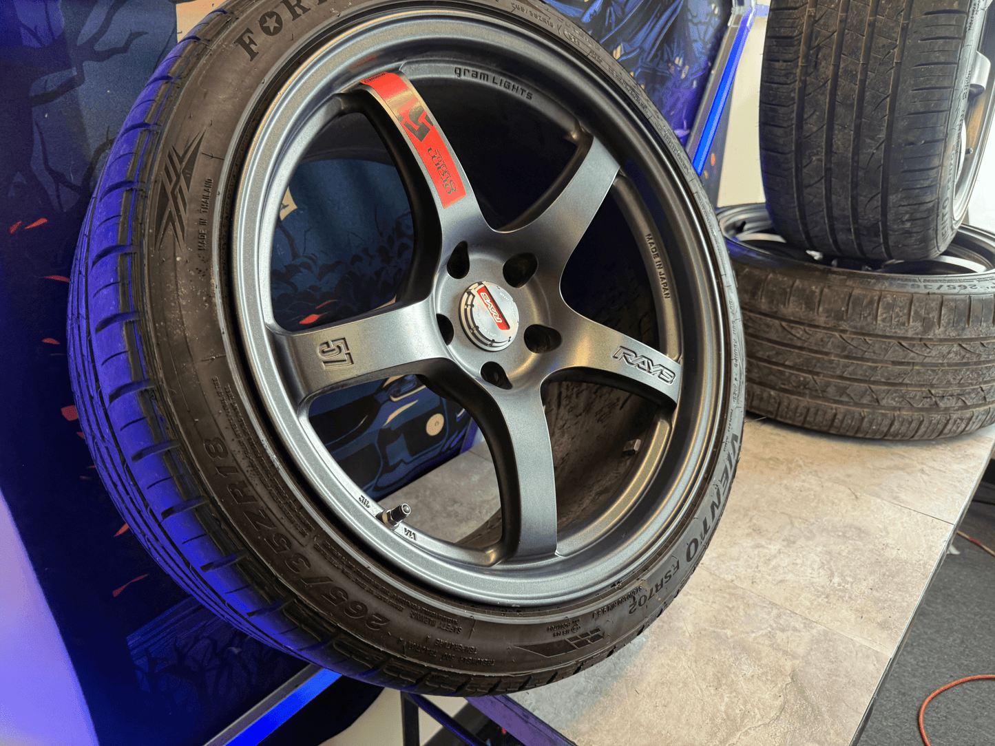 RAYS gramlights gram lights forged wheels & tires Subaru STi 5x114 18x9.5 +22 w/ 265/35zr18 tires