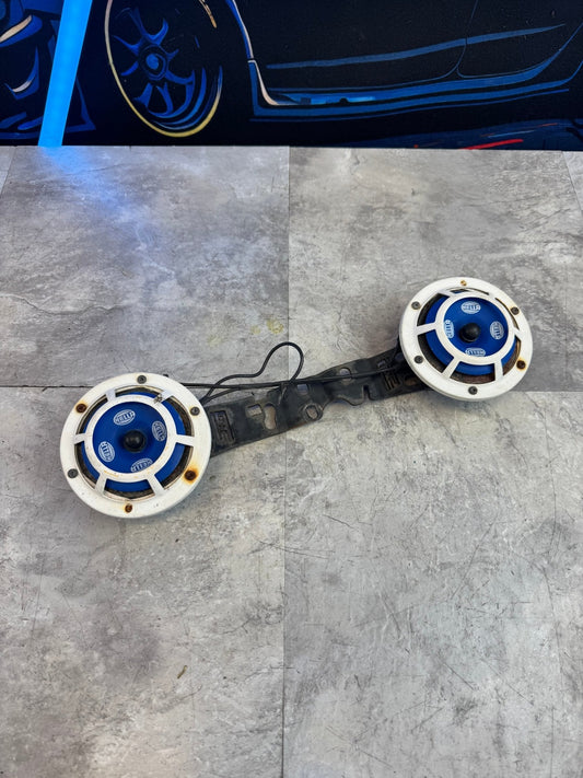 2002-2021 Subaru WRX STi White And Blue Hella Horns With GrimmSpeed Bracket / N2