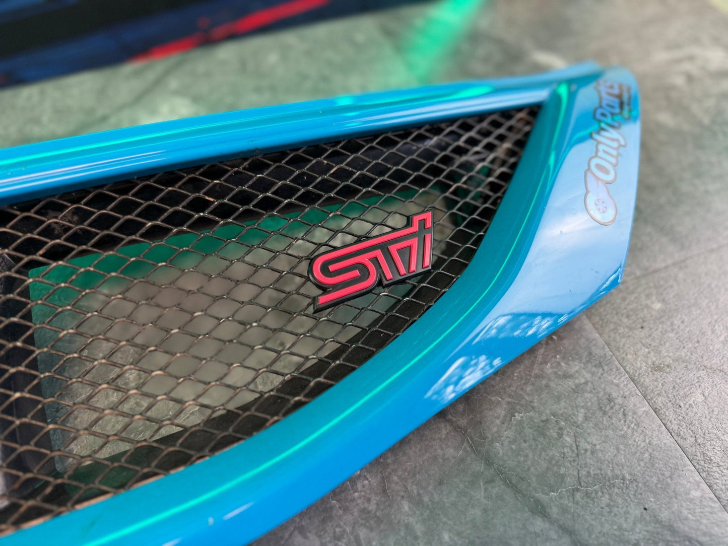 2008 - 2010 Subaru STi oem optional “ sport “ mesh grille assembly w: STi badge