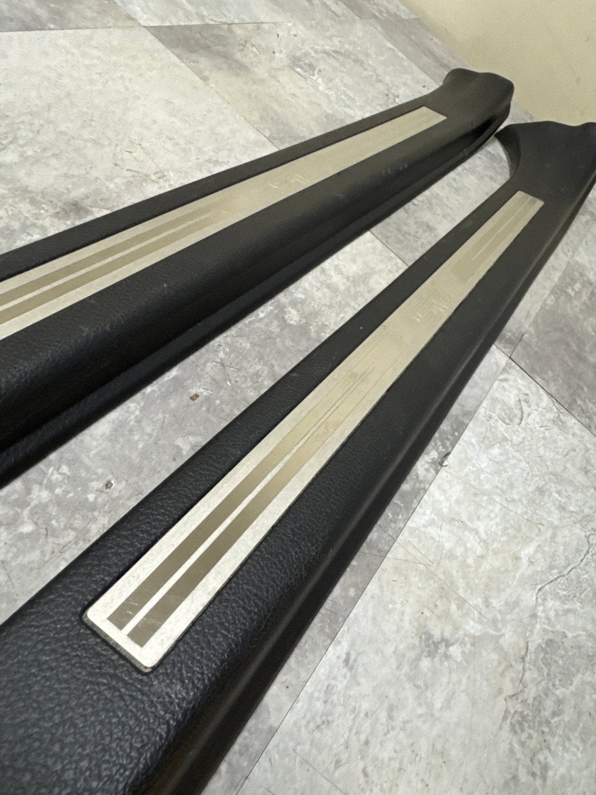 2015-2021 Subaru WRX STi Front OEM Door Sill Trim Set (2)