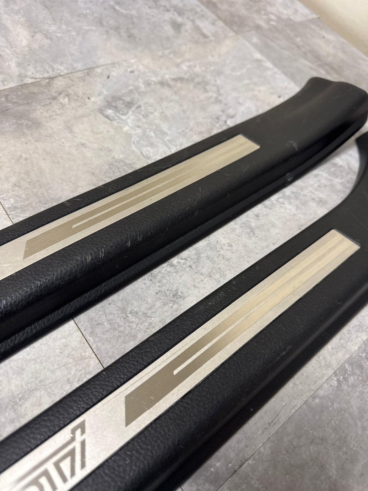 2015-2021 Subaru WRX STi Front OEM Door Sill Trim Set (2)
