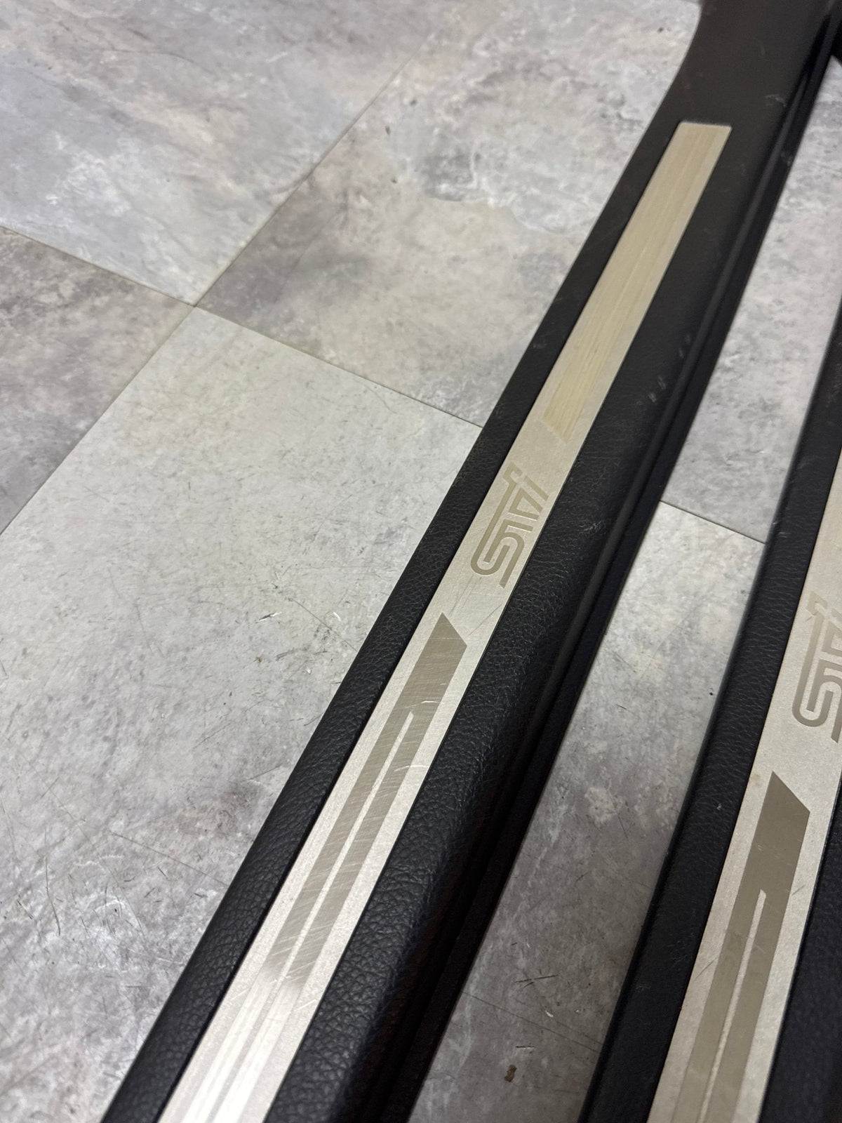 2015-2021 Subaru WRX STi Front OEM Door Sill Trim Set (2)