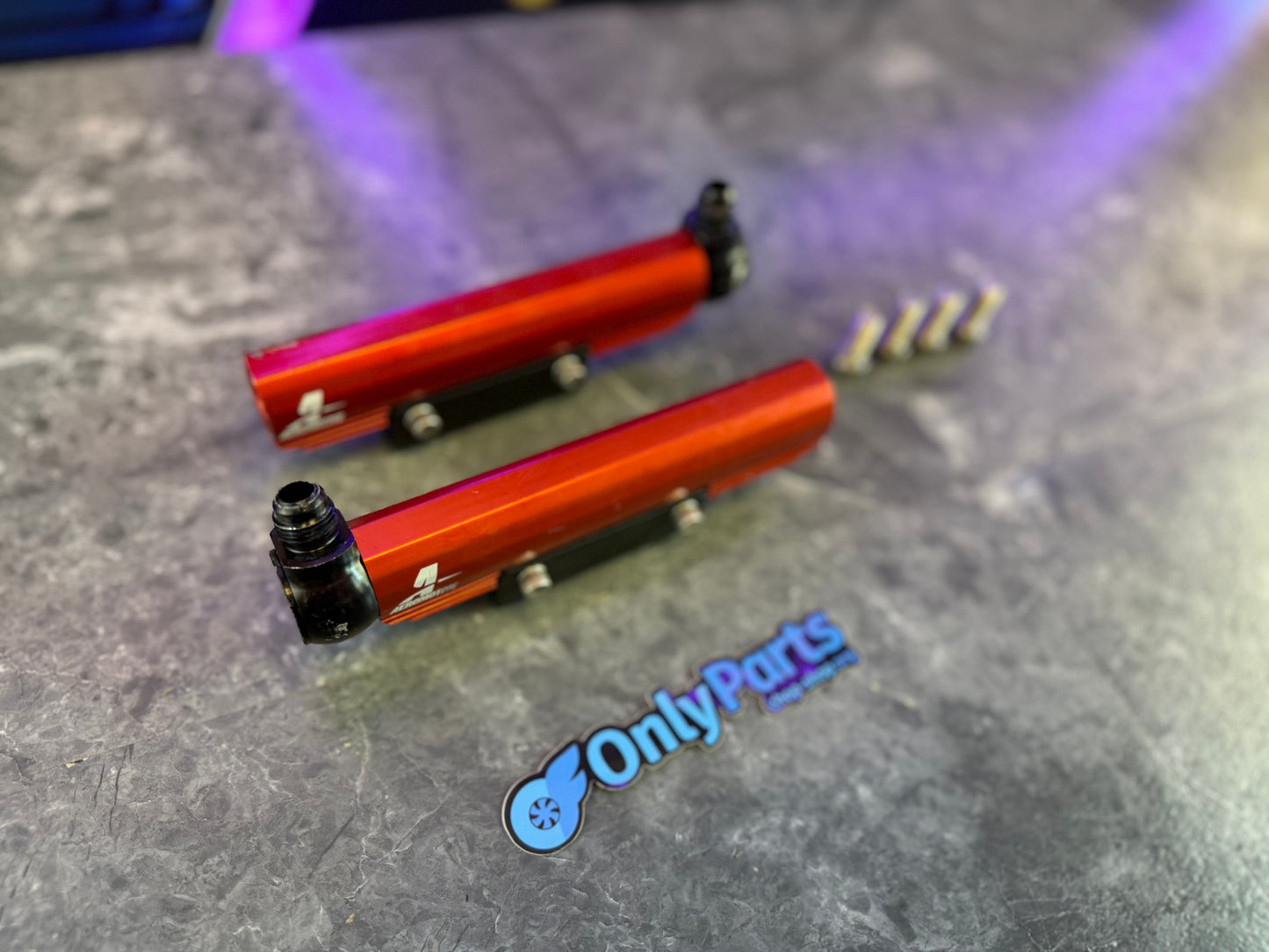 Areomotive fuel rails Subaru STi and wrx top feed billet red