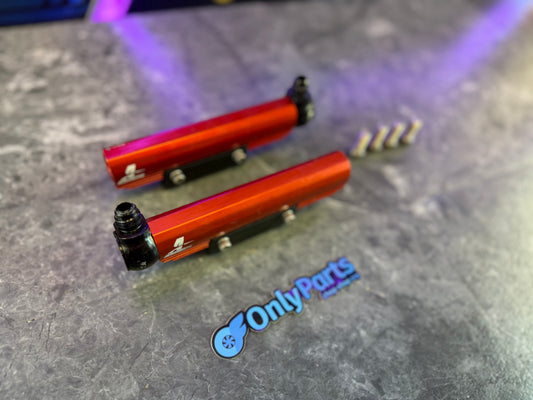 Areomotive fuel rails Subaru STi and wrx top feed billet red