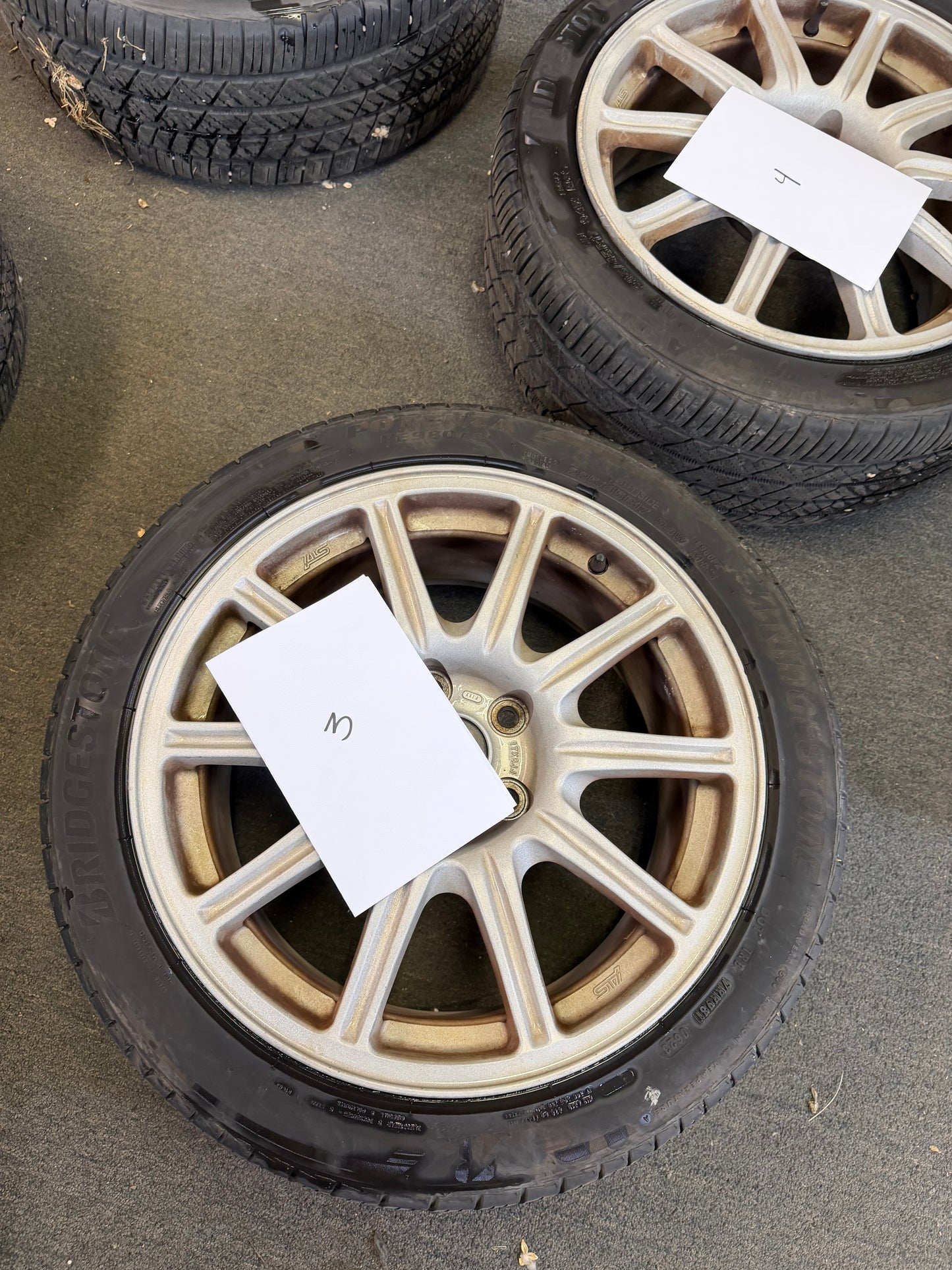 OEM Subaru STi BBS wheels forged 17x8 +53 5x114 w/ 225/45r17 Bridgestone potenza tires wrx