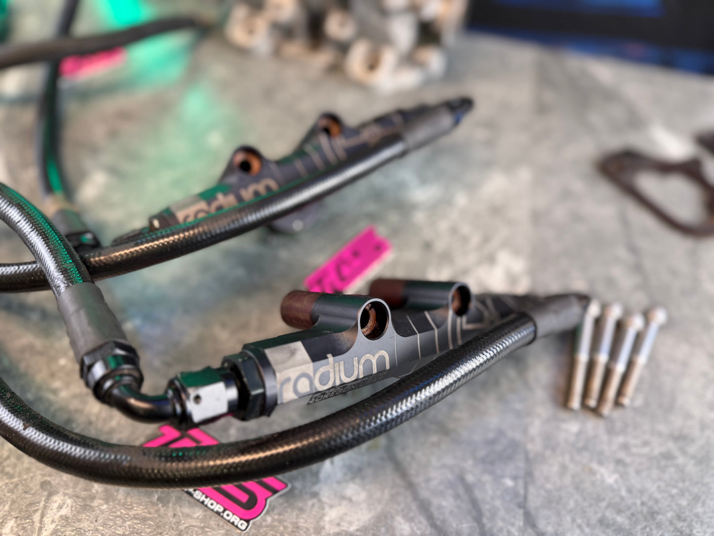 Under hood fueling kit w/ ID 1050 injectors , TGV deletes, radium fuel rails, fuel pulse dampers & areomotive fuel pressure regulator