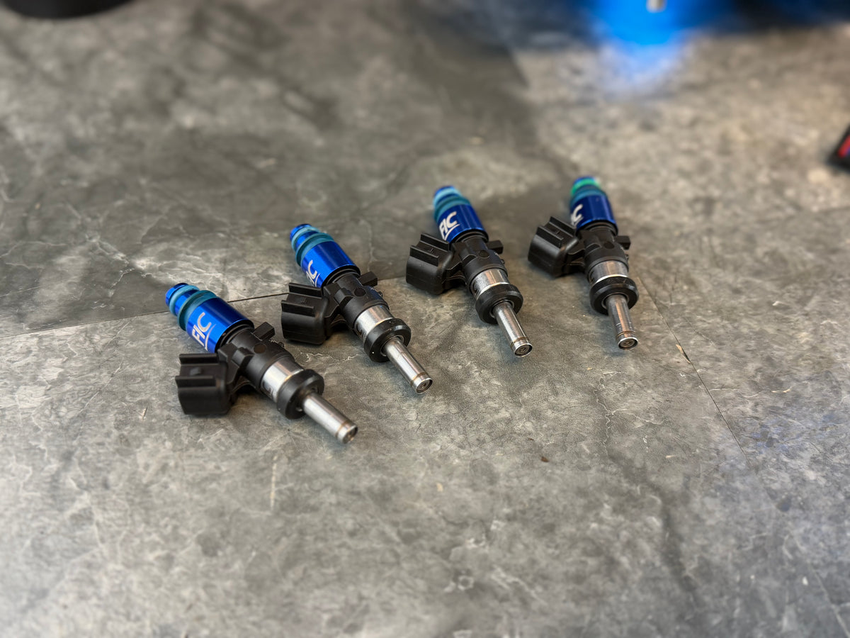 FIC 1440 CC top feed fuel injectors Subaru wrx and STi E85 flex fuel w/ plug & play adapters