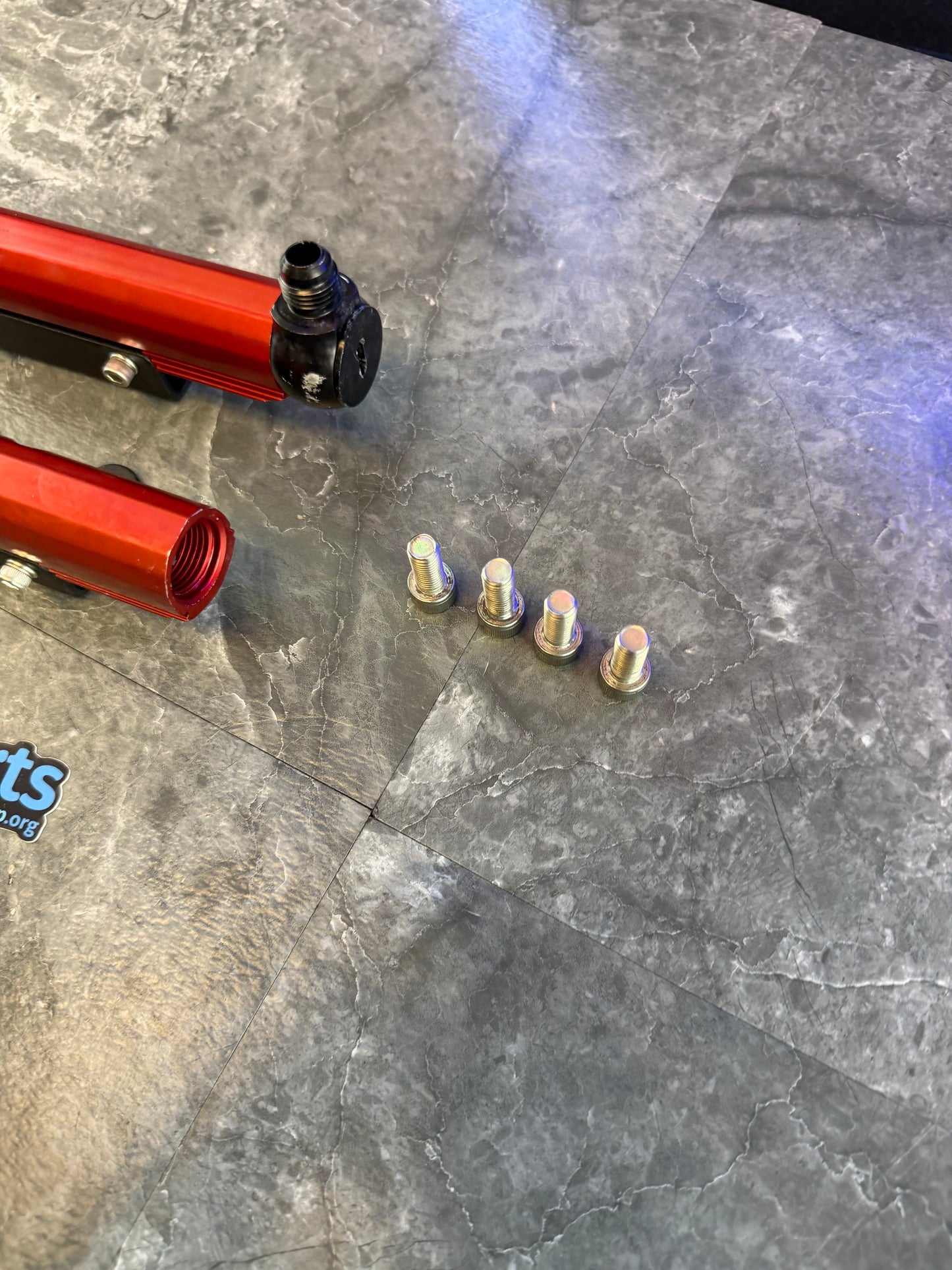 Areomotive fuel rails Subaru STi and wrx top feed billet red