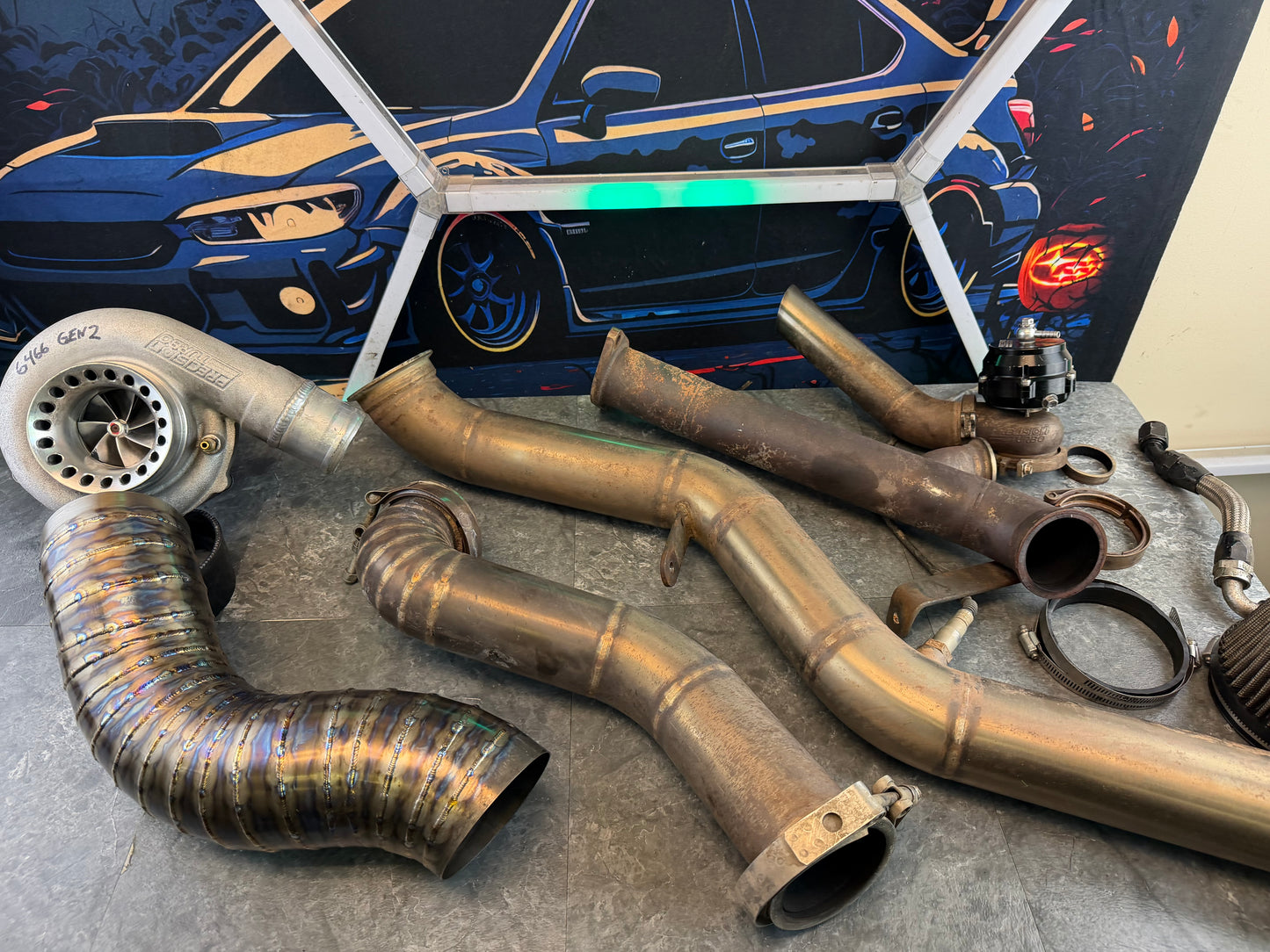 CUSTOM rotated turbo kit ( like ETS ) 08-21 STi 08-14 WRX w: PTE 6466 gen 900 HP & custom pie cut TITANIUM intake SUBARU